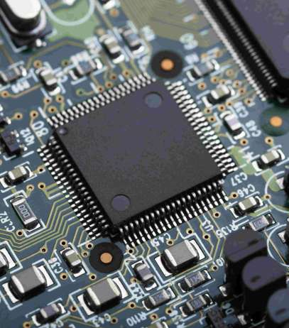 Closeup of electronic circuit board with CPU microchip electronic components background